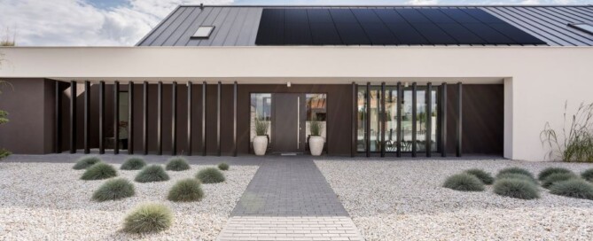 Modern home with solar panels on the roof in Maple Grove, MN