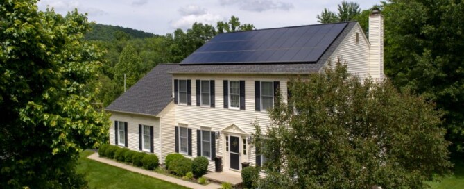 Two-story house with solar panels on the roof in Blaine, MN