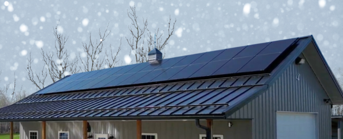 Residential solar panels installed by Wolf River Electric on a metal roof in snowy conditions, showcasing sustainable energy solutions.