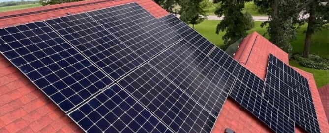 Efficient rooftop solar panel installation by Wolf River Electric, maximizing energy savings and sustainability for homeowners.