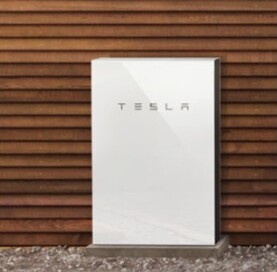 Tesla Powerwall battery system installed by Wolf River Electric, enhancing renewable energy storage and backup power for homeowners.