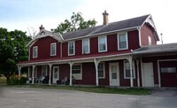 Front shot of the Carver Temperance Hotel during the day.