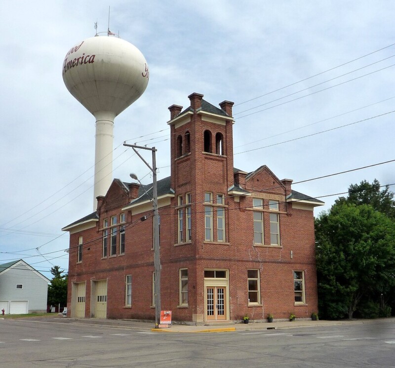 Building with a water tower in the background in Norwood Young America, Minnesota.