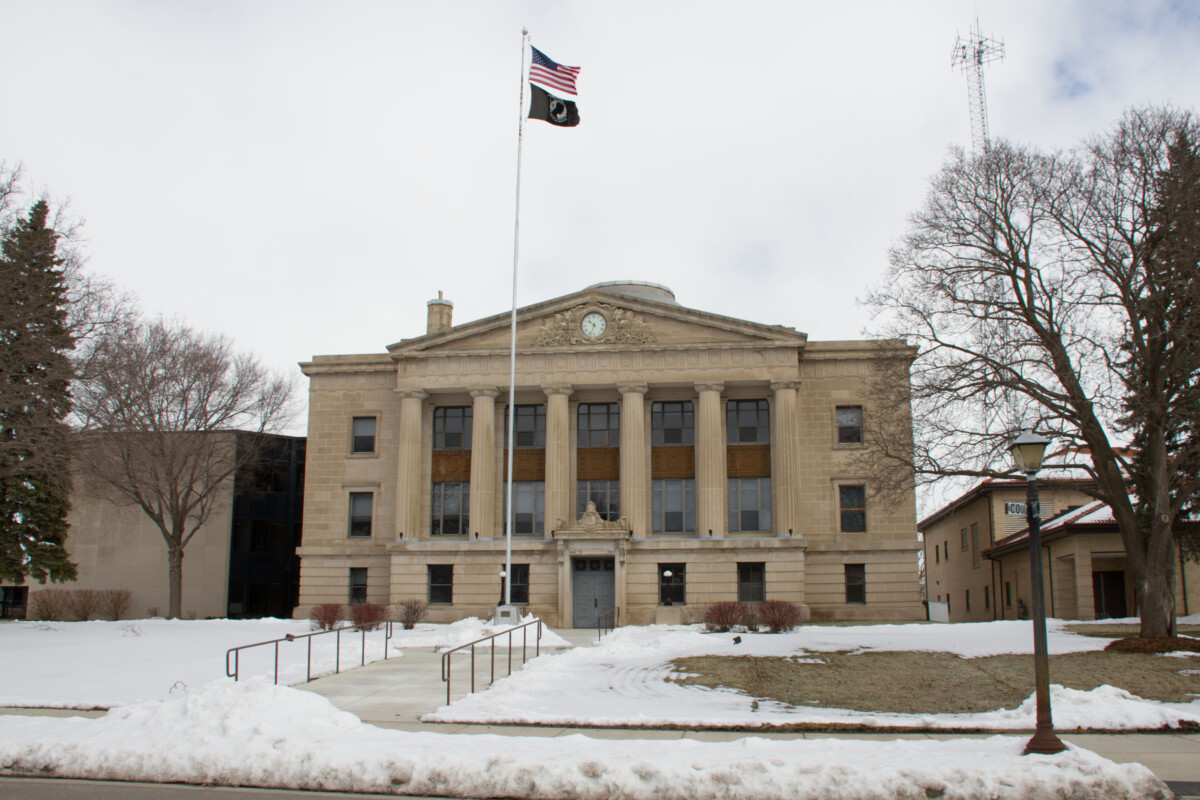 Front shot of the Sibley County Courthouse with snow on the ground in Minnesota during the day. Front shot of the Sibley County Courthouse with snow on the ground in Minnesota during the day.