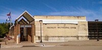 Front shot of the Fridley City Hall Building during the day.
