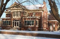 Front shot of the Adolph C. Ochs House during the day.