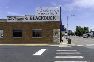 A Welcome to Blackduck sign on a building during the day. A Welcome to Blackduck sign on a building during the day.