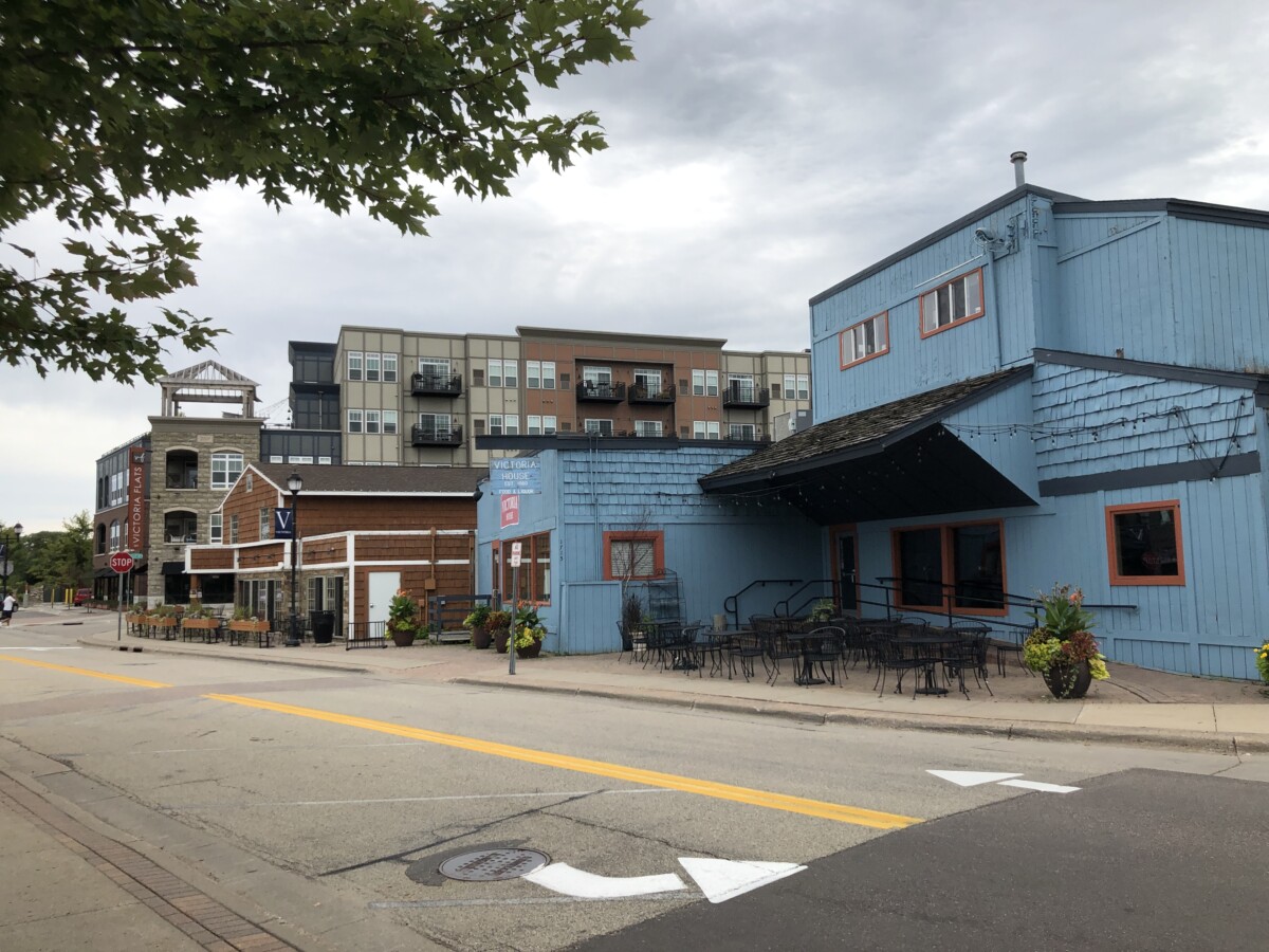 Businesses in downtown Victoria, Minnesota on a cloudy day.