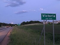 Sign for Victoria along a highway.