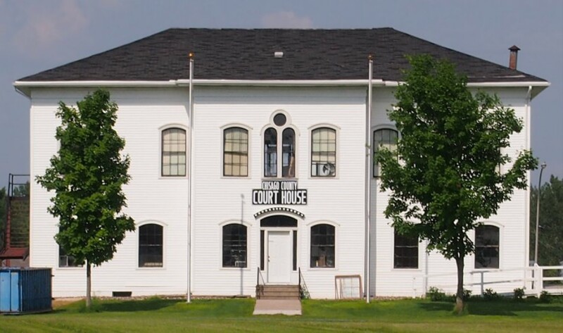 Front view of the Chisago County Courthouse during an overcast day.