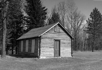 Black and white photo of a school house.
