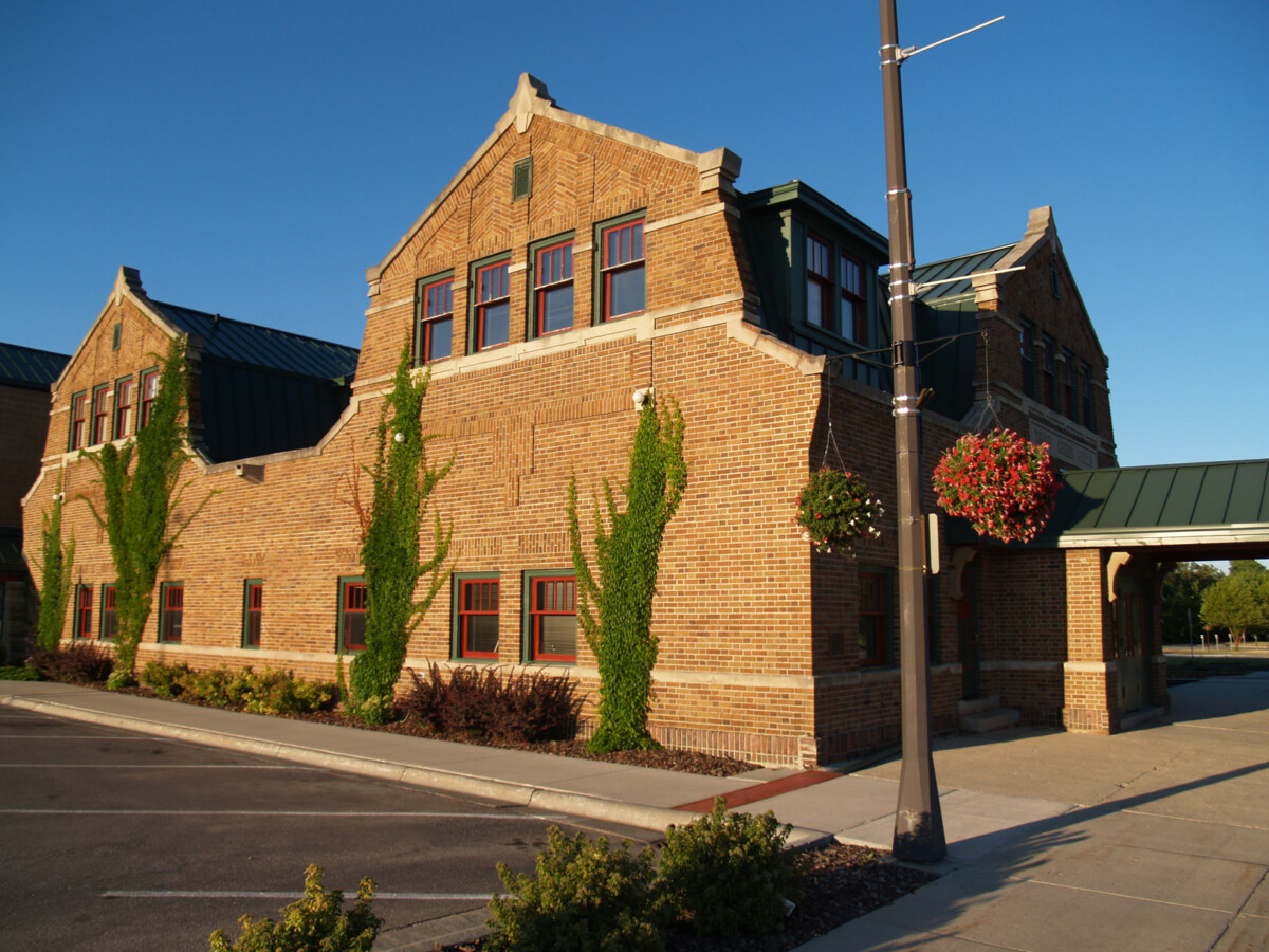 Back view of the Soo Line Depot building with ivy on its walls in Thief River Falls, Minnesota during the day. Back view of the Soo Line Depot building with ivy on its walls in Thief River Falls, Minnesota during the day.
