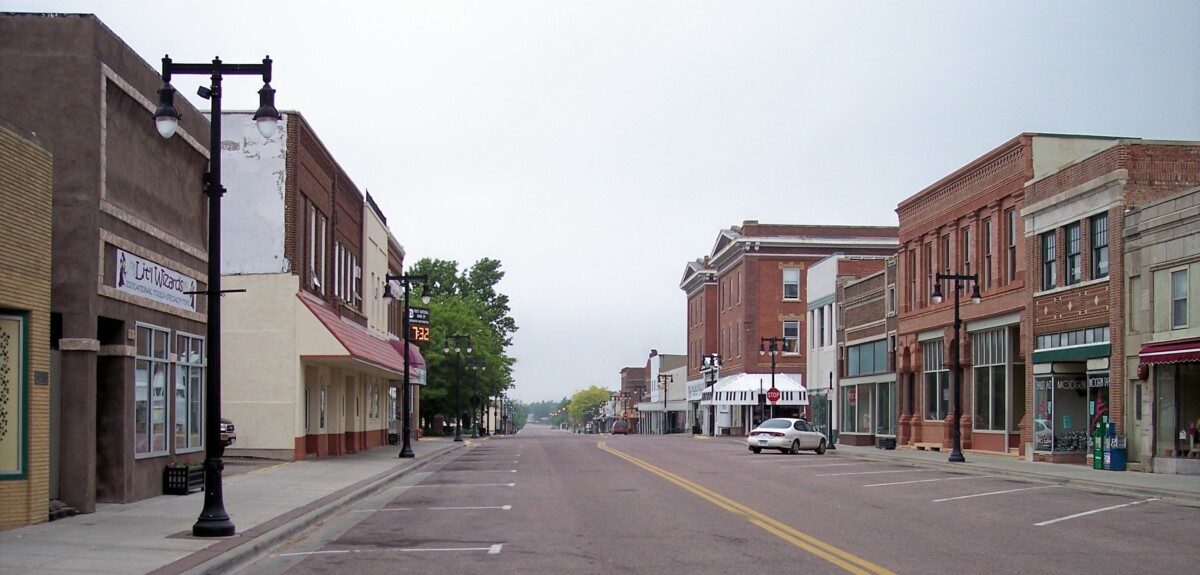 A street with businesses in Worthington, Minnesota during the day. A street with businesses in Worthington, Minnesota during the day.