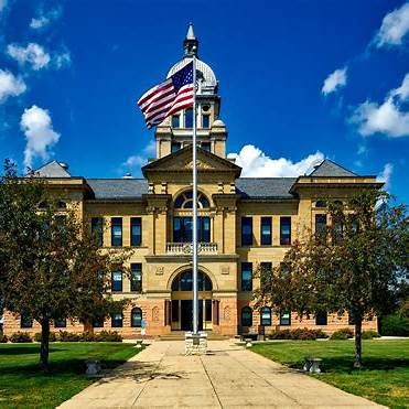 Historic Benton County Courthouse in Sauk Rapids, Minnesota, built in 1902, showcasing classic Midwestern civic architecture