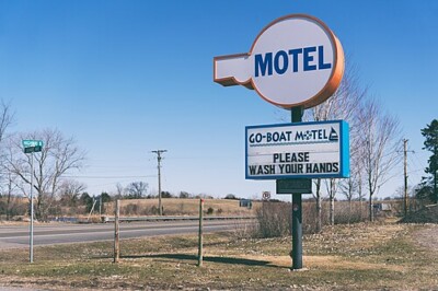 A motel sign in Center City, Minnesota reading, "Please Wash Your Hands".