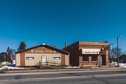 Snow-covered Minneapolis home with rooftop space suitable for solar panels, residential solar installation opportunity by Wolf River Electric
