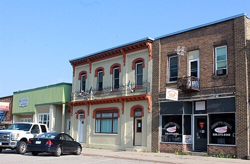 Snow-covered Minneapolis home with rooftop space suitable for solar panels, residential solar installation opportunity by Wolf River Electric