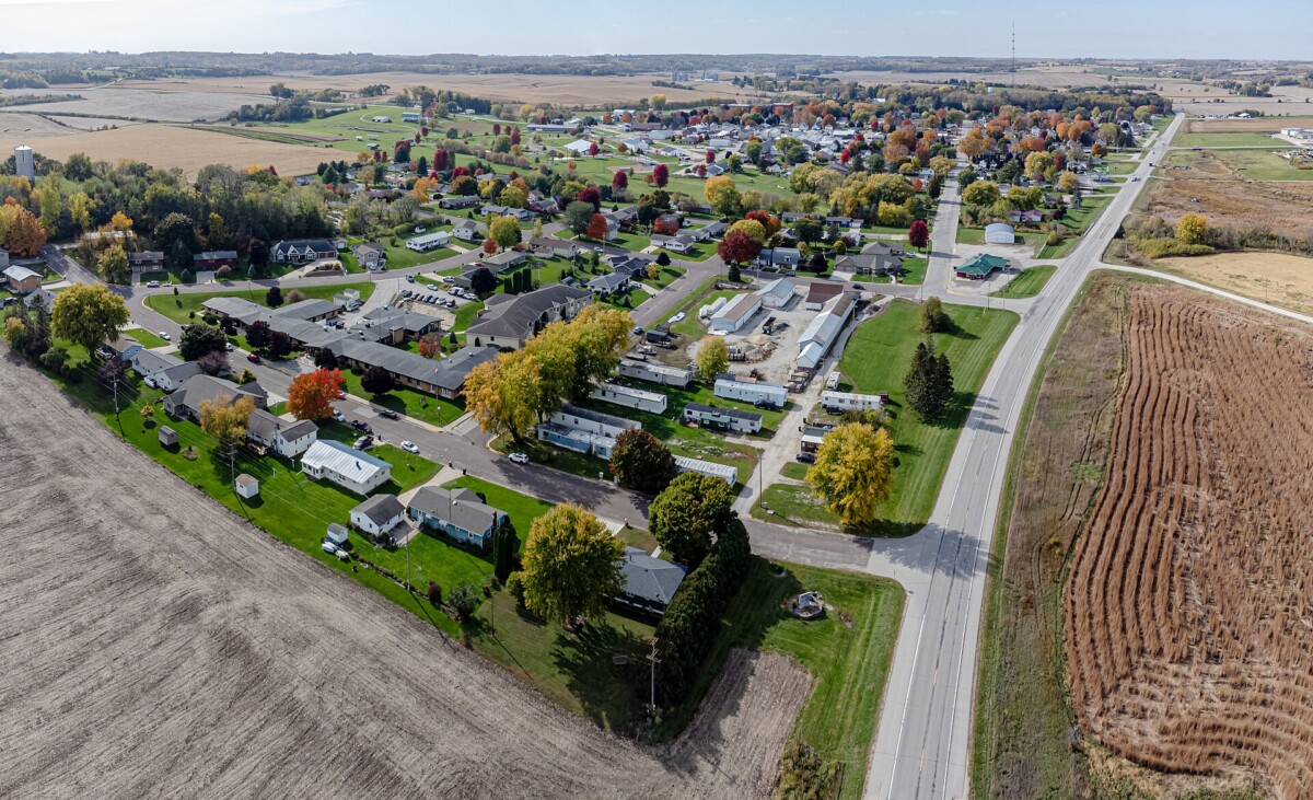 A corner shot of the Chippewa County Bank against a clear blue sky during the day.