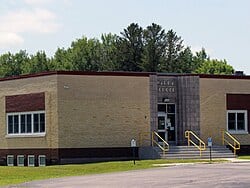 Snow-covered Minneapolis home with rooftop space suitable for solar panels, residential solar installation opportunity by Wolf River Electric