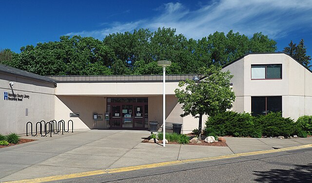Snow-covered Minneapolis home with rooftop space suitable for solar panels, residential solar installation opportunity by Wolf River Electric
