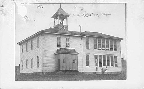 Snow-covered Minneapolis home with rooftop space suitable for solar panels, residential solar installation opportunity by Wolf River Electric