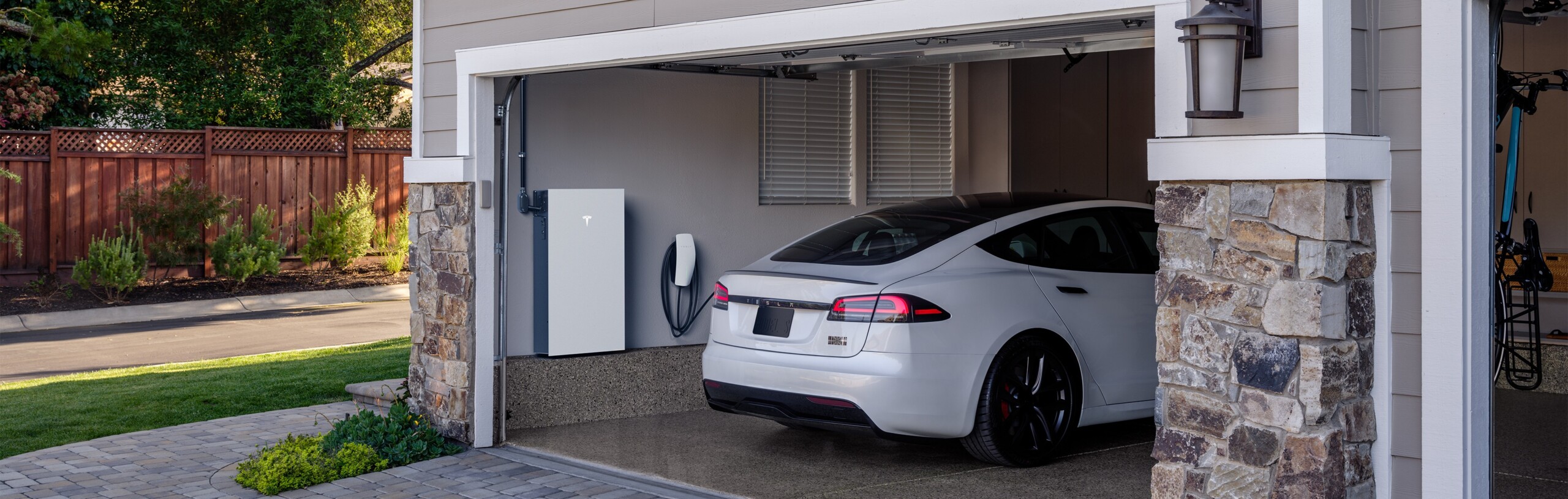 Tesla Powerwall installed in a modern home by Wolf River Electric for energy storage and backup power.