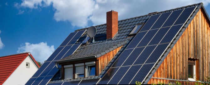 Residential rooftop solar panels on a modern home illustrating solar installation for new construction and retrofit homes by Wolf River Electric.