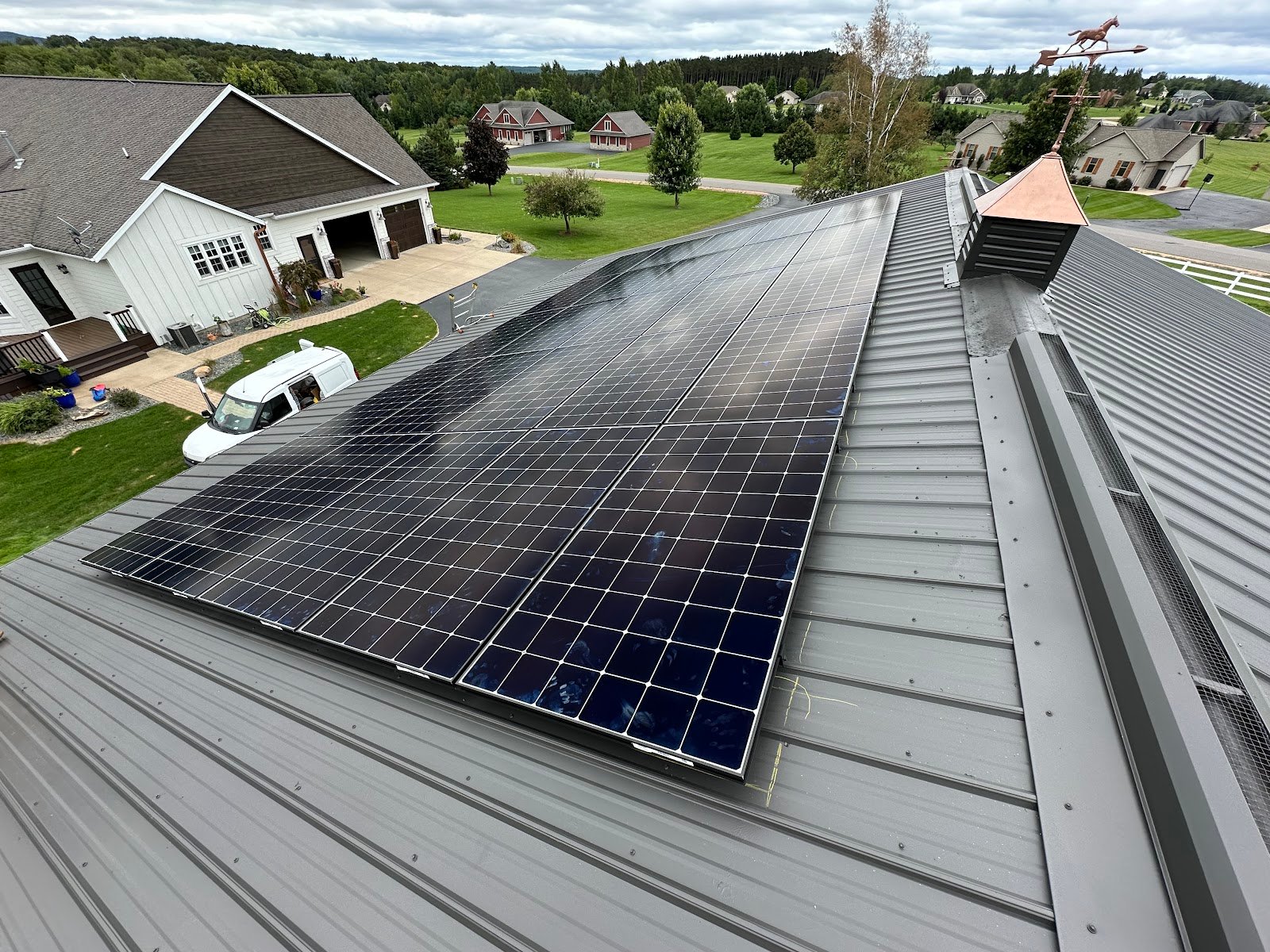 Aerial roof solar panels, installed by Wolf River Electric
