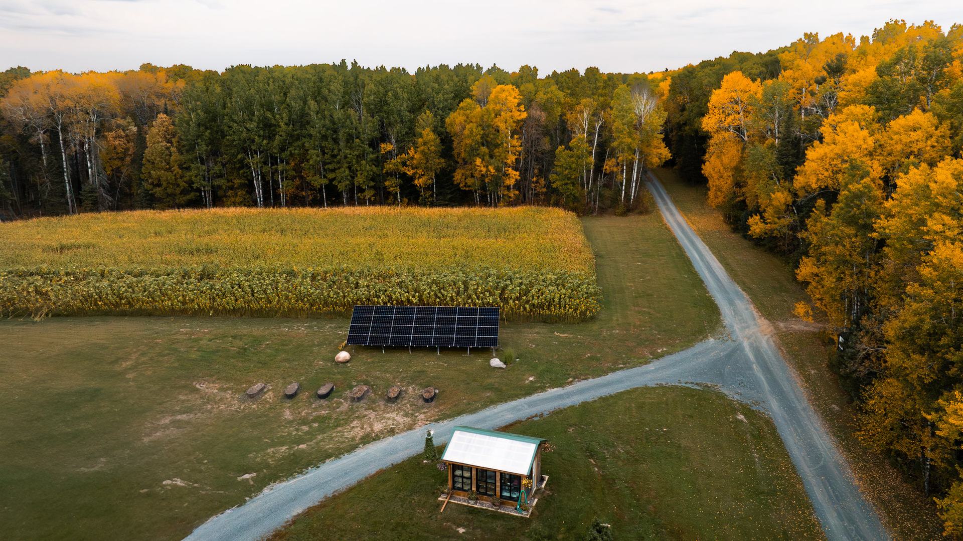 Aerial view of a ground-mount solar array in a field