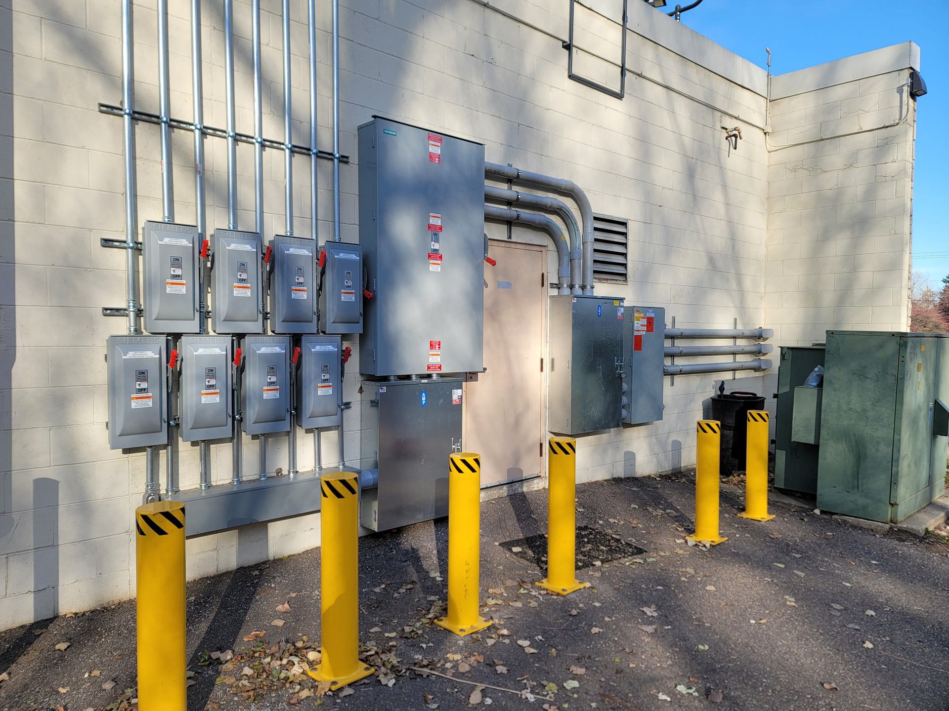 Commercial electrical service and disconnects on a building wall