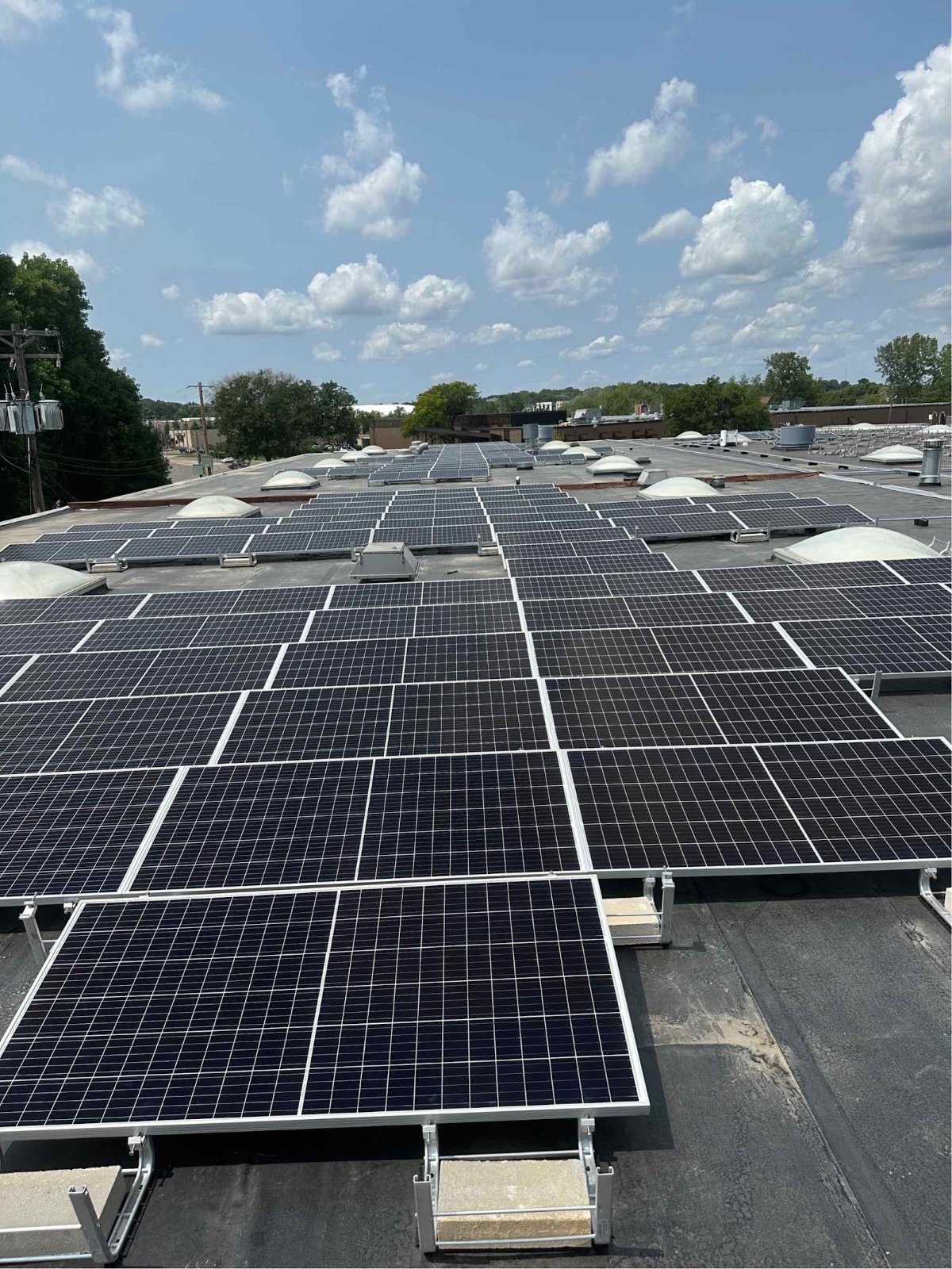 Dense rooftop solar array, installed by Wolf River Electric