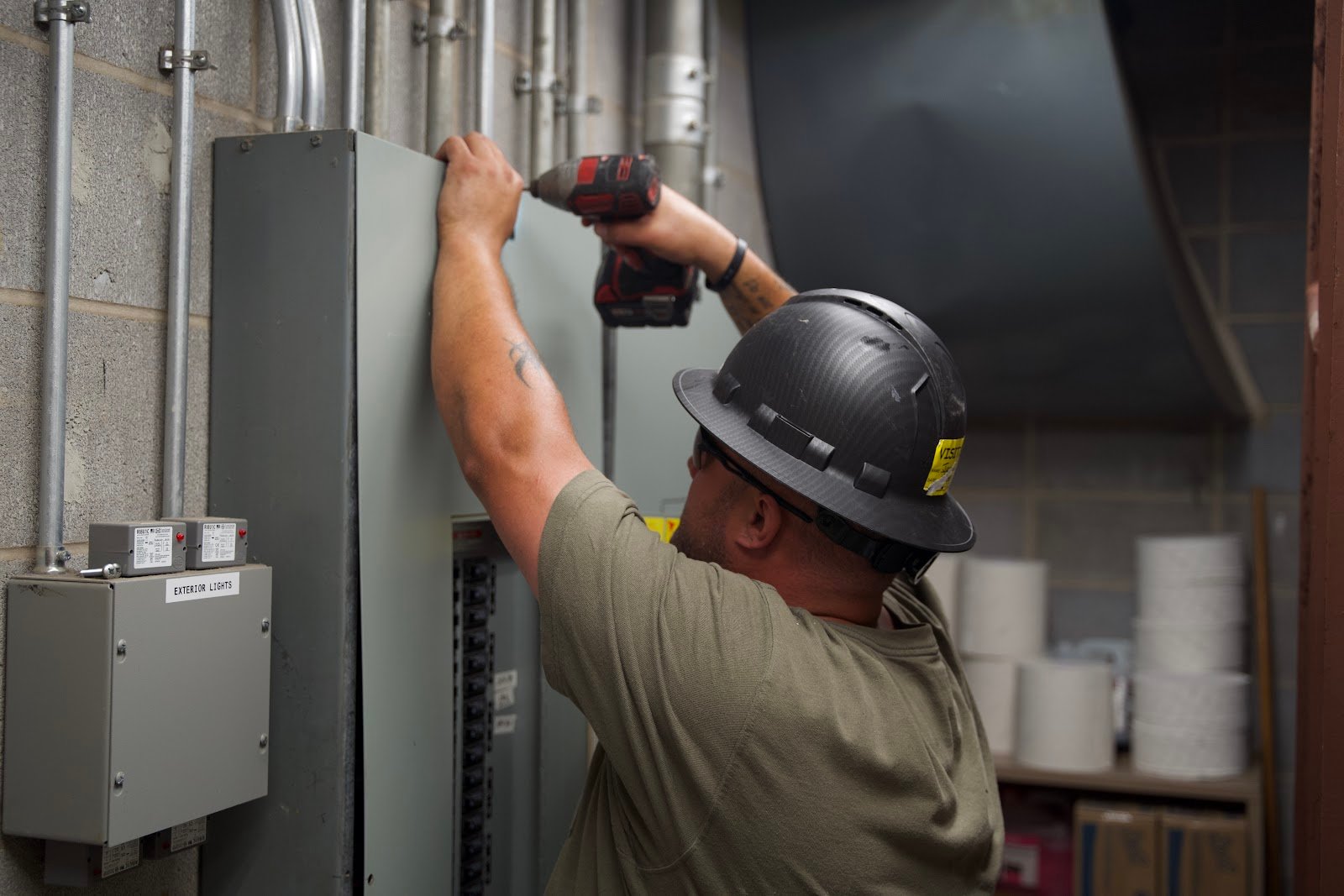 Wolf River Electric electrician hard hat panel side