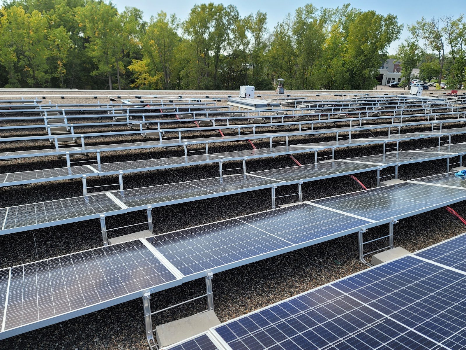 Flat roof rows ballast solar, installed by Wolf River Electric