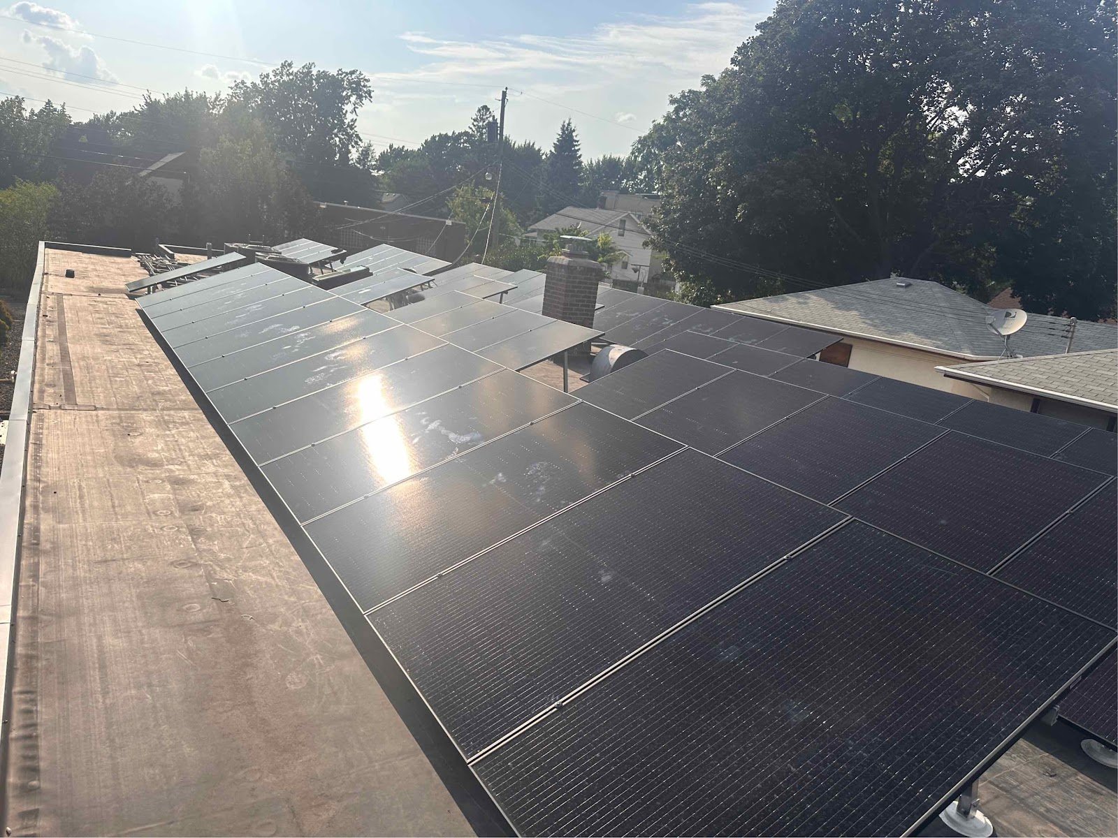 Flat roof solar array, installed by Wolf River Electric