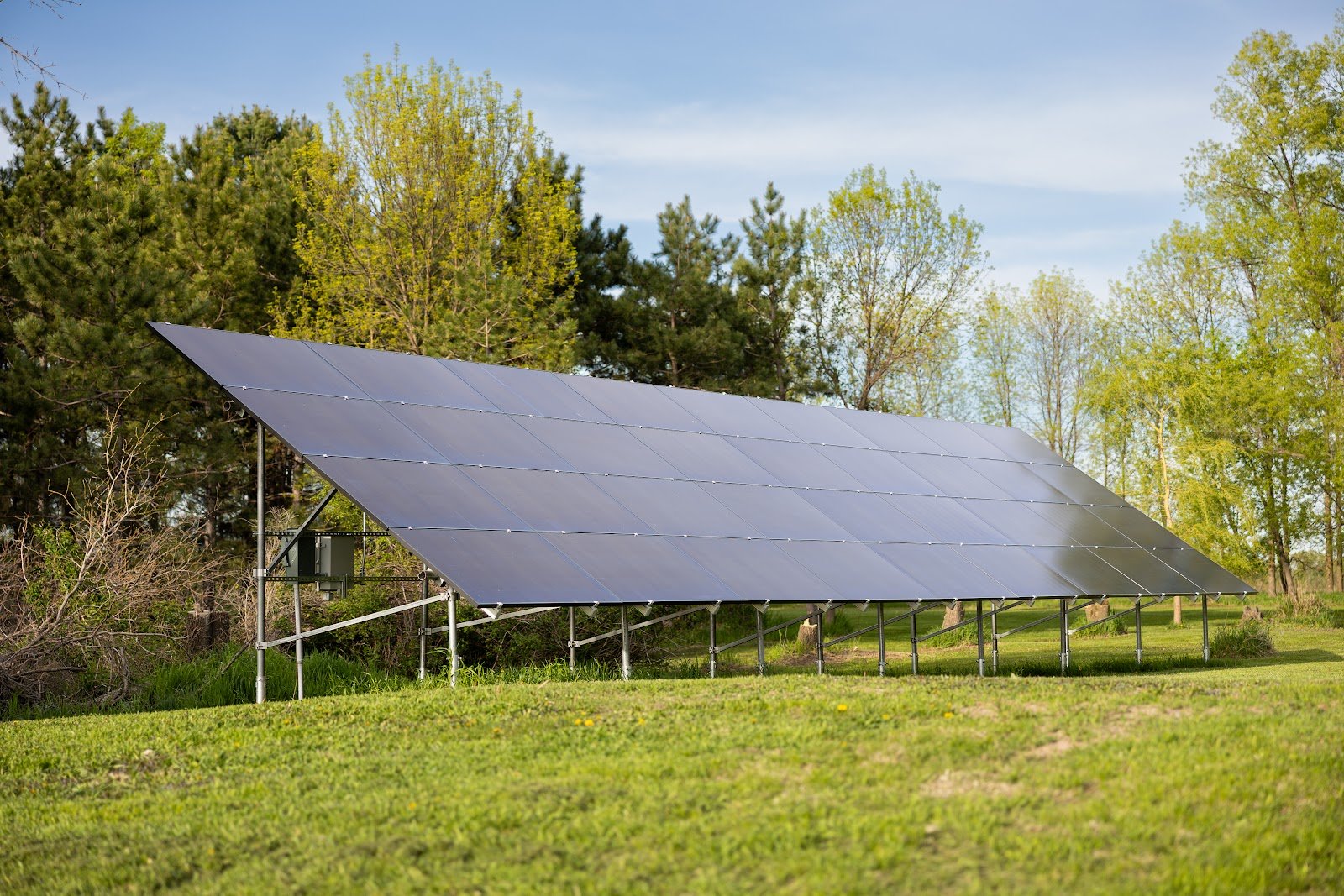 Ground-mount solar array trees, installed by Wolf River Electric