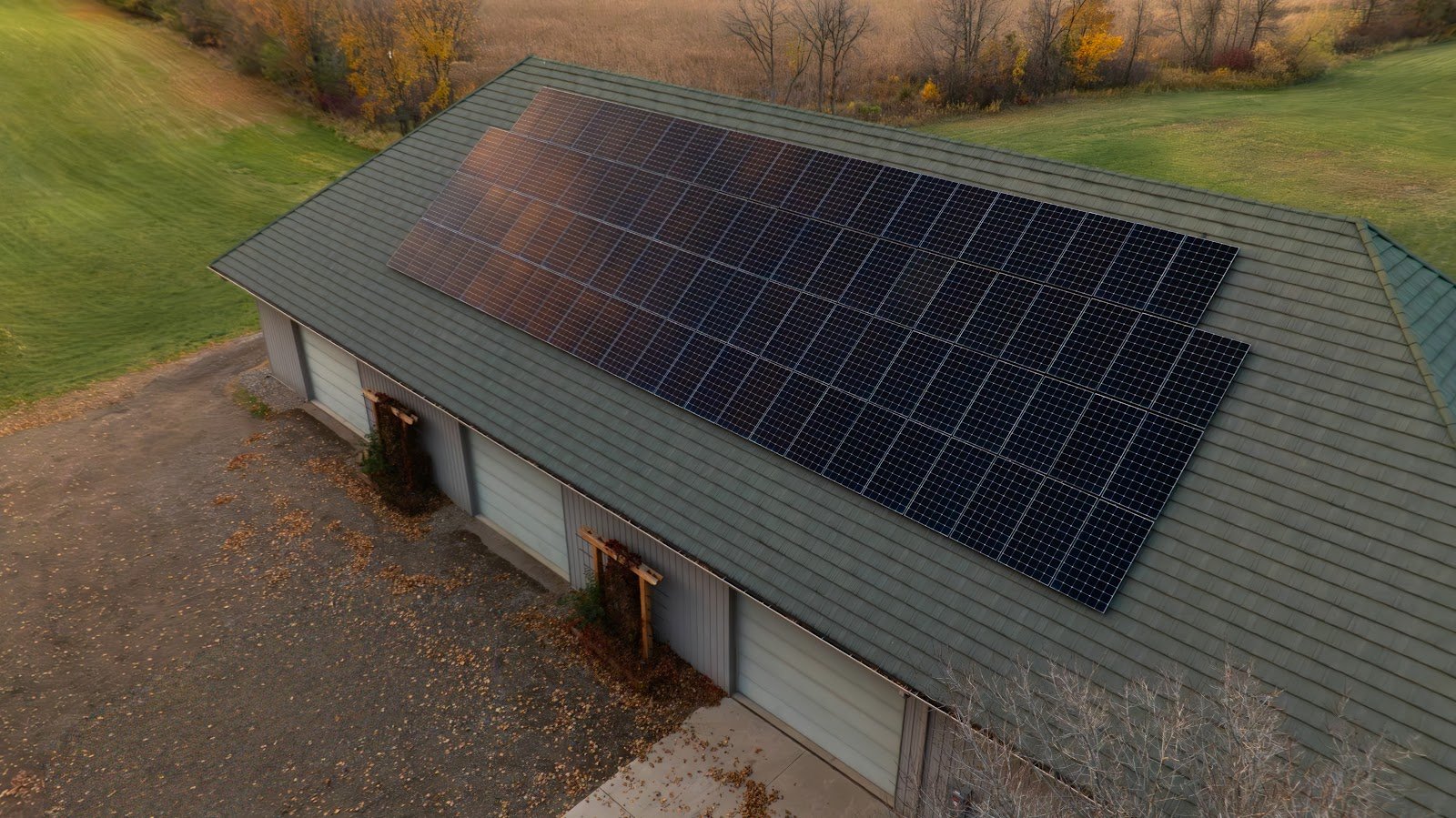 Home in open field solar panels, installed by Wolf River Electric