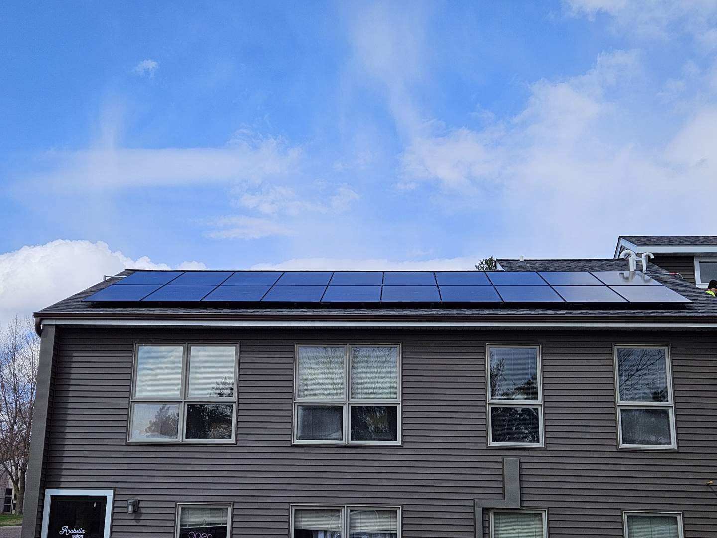 Home with solar panels siding, installed by Wolf River Electric