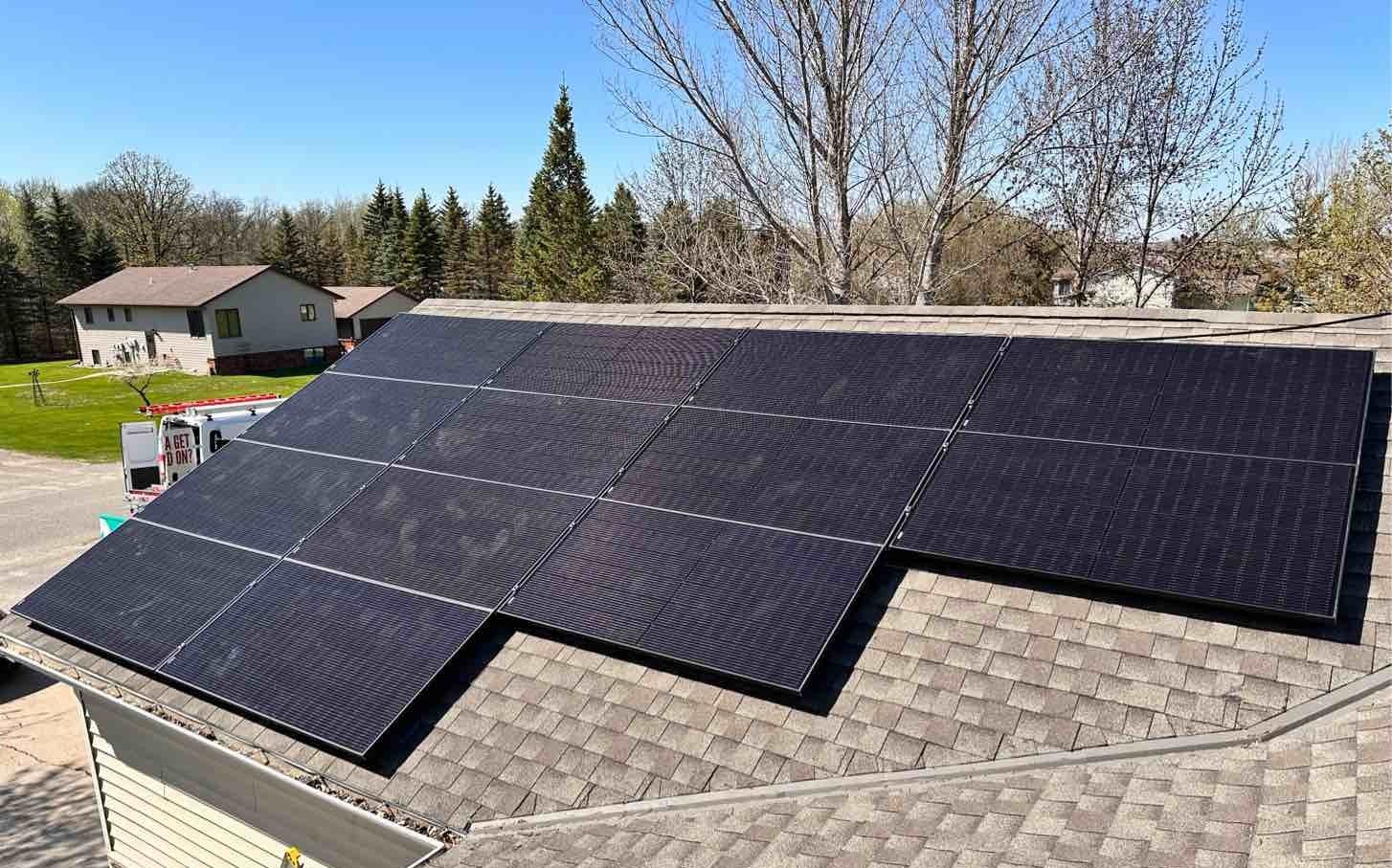 Roof solar panels neighborhood view, installed by Wolf River Electric