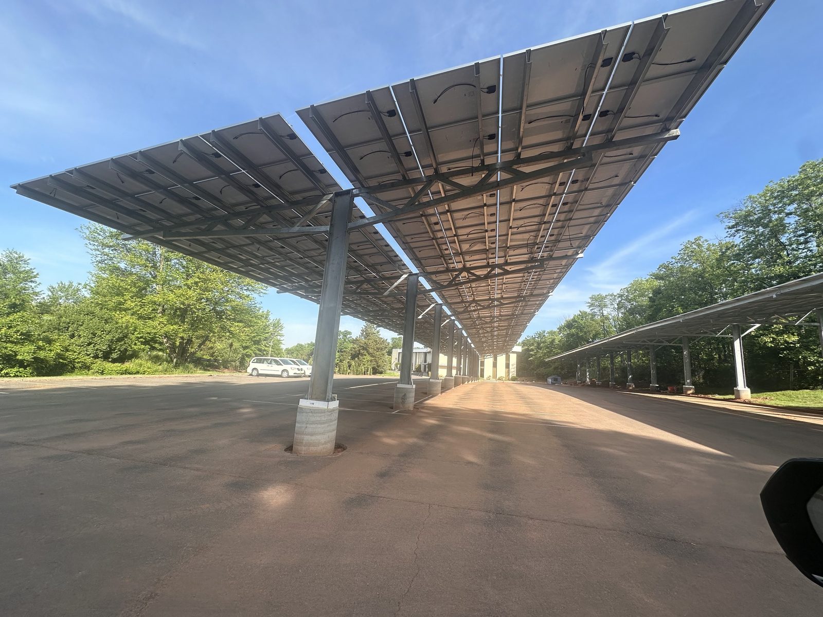 Solar carport canopy and columns, installed by Wolf River Electric