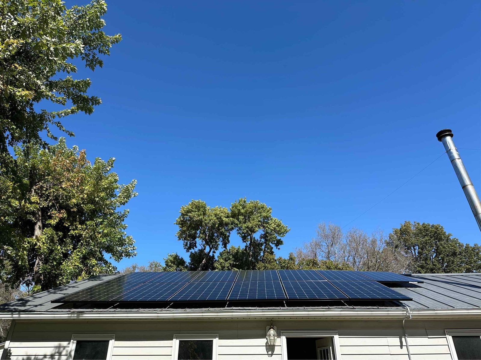 Solar on low pitch home roof, installed by Wolf River Electric