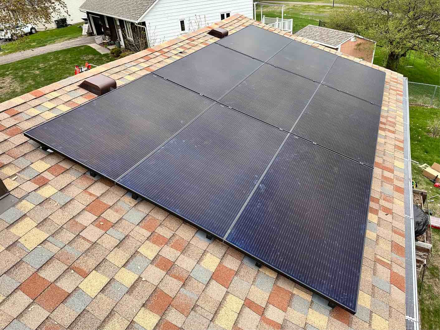 Solar panels on shingle roof, installed by Wolf River Electric