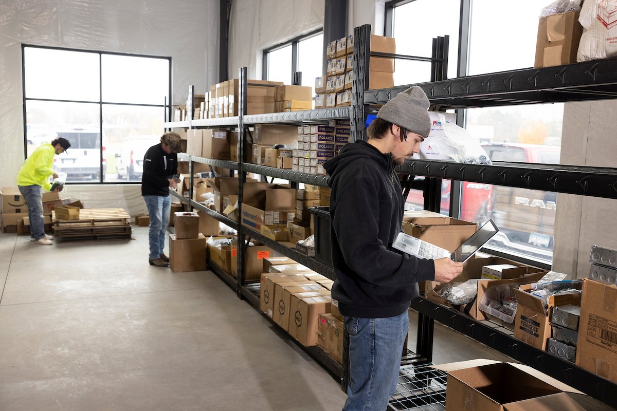 Wolf River Electric warehouse team picking orders